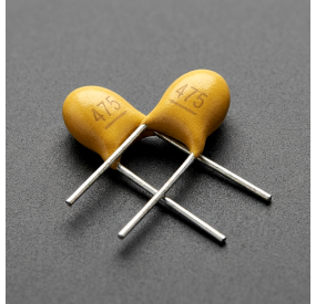 Capacitor Cerámico 4.7uF 50V con Distancia entre Patas 5.08mm - Paquete de 1000 Unidades